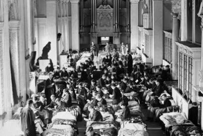 The Long Library at Blenheim Palace, converted into a dormitory for the boys of Malvern school in 1940