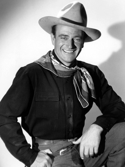 A boy named Marion: John Wayne pictured on the set of Stagecoach (1939)