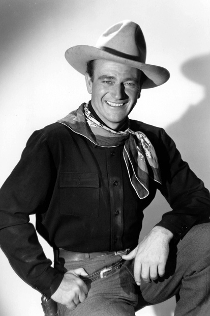 A boy named Marion: John Wayne pictured on the set of Stagecoach (1939)